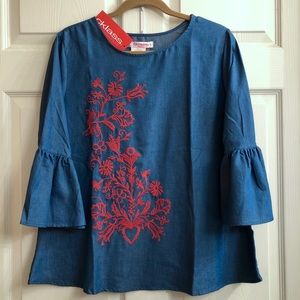 Denim blouse with red embroidery